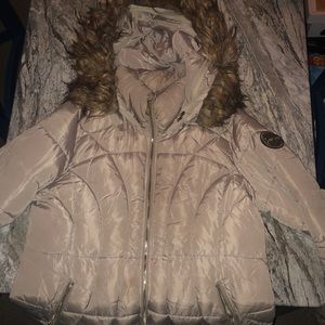 This is a tan Bebe coat/jacket used for the winter. It is very comfortable.